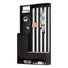 A black entryway organizer with a bench, shelves, and coat hooks, against a white background. Produktbild-Vorschau