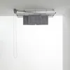 A ceiling-mounted clothes drying rack with towels hanging from it. Podgląd zdjęcia produktu