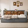A daybed with a built-in bookshelf headboard is shown in a bedroom setting. Anteprima dell’immagine prodotto