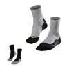 A pair of grey and black running socks are displayed against a white background. Produktbild-Vorschau