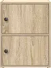 A front view of a two-door wooden cabinet with black knobs. Náhled obrázku produktu