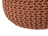 A close-up view of a knitted pouf. Produktbild-Vorschau