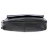 A top-down view of a black leather handbag. Náhled obrázku produktu