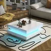 A modern living room scene featuring a white coffee table with LED lighting, a yellow armchair, and a sofa.