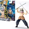 A product shot of a Demon Slayer Inosuke Hashibira action figure in its packaging, with the figure also shown outside of the packaging. Náhled obrázku produktu