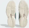 The underside of two Adidas D.o.n. Issue 4 shoes. Voir les images du produit