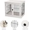 A white dog crate with two doors and black metal bars, shown from the front. Below the crate are three close-up images highlighting the bottom lock, metal wire enclosure, and anti-slip foot pads. Produktbild-Vorschau