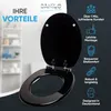 A black toilet seat is shown open, with a blurred background of a bathroom shelf. Text overlays highlight product benefits. Náhled obrázku produktu