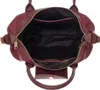 The image shows the interior of a burgundy handbag. Produktbild-Vorschau