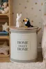 A children's room with a storage bin, toys, and decorations. Náhled obrázku produktu