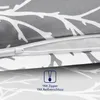 A close-up view of a zipper on a bedding set with a branch pattern. Produktbild-Vorschau