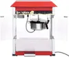 A red and silver popcorn machine with clear side doors. Náhľad obrázku produktu
