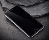 A smartphone screen protector is shown on a dark, textured surface with rocks in the background. Produktbild-Vorschau