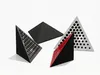 Four triangular pyramid-shaped acoustic foam bass traps with perforated panels are arranged on a white background. Podgląd zdjęcia produktu