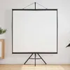 A white projection screen on a black tripod stand is set up against a white wall, with a wooden cabinet and a plant visible on the left. Anteprima dell’immagine prodotto
