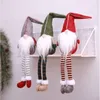Three plush gnomes sitting on a shelf. Náhled obrázku produktu