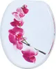 A toilet seat with a pink orchid design. Náhľad obrázku produktu