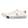 A single white sneaker is shown from the side against a white background. Produktbild-Vorschau