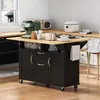 A kitchen island with appliances and kitchenware on a countertop, in a kitchen setting. Produktbild-Vorschau