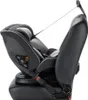 A side view of a black and gray car seat, secured to a car seat with a strap. Náhľad obrázku produktu