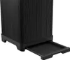A close-up view of the bottom section of a black trash can with a pull-out tray. Anteprima dell’immagine prodotto