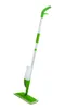 A spray mop with a green base and handle, and a white water reservoir, is shown against a white background. Produktbild-Vorschau