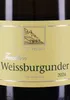 A close-up of a wine label on a bottle. Produktbild-Vorschau