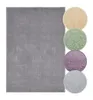 Weicher Hochflor Teppich in Anthrazit, mit Farbmustern in, Grau, Lavendel, Creme, Salbei.
