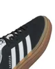 A close-up view of the toe box and side of a black Adidas Gazelle Bold sneaker with white stripes and a gum sole. Anteprima dell’immagine prodotto