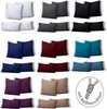 A collage of various colored cushion covers arranged in rows and columns, with a circular graphic indicating a zipper closure. Produktbild-Vorschau