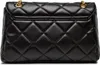 The back of a black quilted handbag. Produktbild-Vorschau