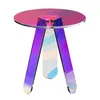 A clear studio shot of a small, round side table with an iridescent, multi-colored finish. Anteprima dell’immagine prodotto