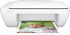 A white HP Deskjet 2130 printer is shown from the front, printing a picture of a baby. Produktbild-Vorschau