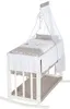 A baby crib with bedding and a canopy. Produktbild-Vorschau