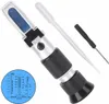 A refractometer for testing vehicle fluids, along with a pipette and a small screwdriver, is displayed against a white background. Náhled obrázku produktu