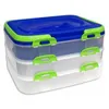 A stack of three clear plastic food containers with blue lids and green latches, presented against a white background. Náhled obrázku produktu