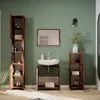 A bathroom with wooden furniture, a sink, and a mirror. Produktbild-Vorschau