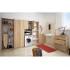 A laundry room or bathroom with storage cabinets, a washing machine, and a sink. Produktbild-Vorschau