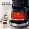 Close-up of a coffee maker's glass carafe with hot coffee inside, highlighting its features. Produktbild-Vorschau