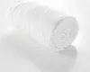 A white muslin fitted sheet is rolled up and placed on a white surface. Anteprima dell’immagine prodotto