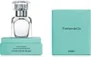 A Tiffany & Co. Sheer Eau De Toilette spray bottle and its packaging are displayed against a white background. Náhled obrázku produktu
