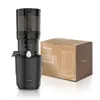 A black Kuvings slow juicer is shown next to its packaging box. Produktbild-Vorschau