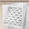 A white fabric wardrobe is shown with a patterned pillow inside one of the compartments. Produktbild-Vorschau