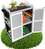 A garden cabinet with various gardening tools and supplies displayed on a patch of grass. Produktbild-Vorschau