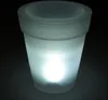 A lit-up planter pot in a dark setting. Produktbild-Vorschau