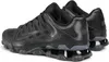 A pair of black Nike Reax 8 Tr Mesh sneakers shown from a side-rear angle. Produktbild-Vorschau