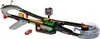 A toy race track set with a toy car. Produktbild-Vorschau