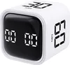 A white cube timer with a digital display. Produktbild-Vorschau