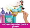A doll is shown on a flying carpet, with a castle playset in the background. Podgląd zdjęcia produktu