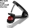A cherry pitter is shown with a cherry in place, ready to be pitted. Text highlights its ability to pit both large and small cherries. Anteprima dell’immagine prodotto